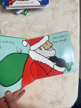 That's not my santa...: An Interactive, Sensory Touchy-Feely Holiday Book with Tactile Patches for Babies and Toddlers
