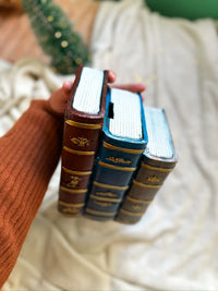 حصالة لتجميع الاموال على شكل كتاب